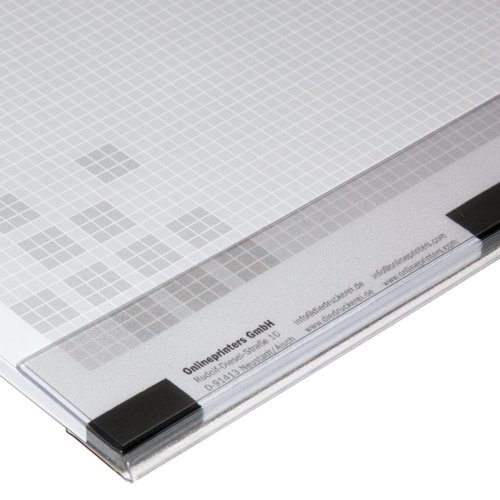 Paper desk pad with edge protection.