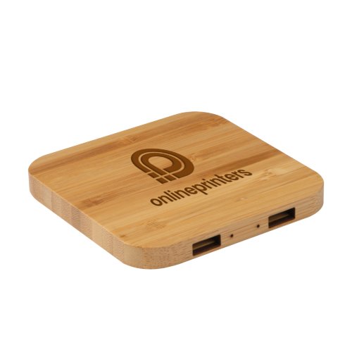 Light wood bamboo wireless charger with multiple USB ports.
