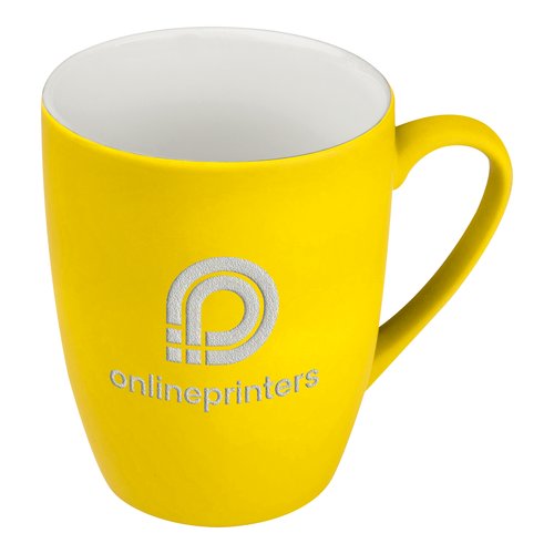 Yellow ceramic mug with handle.