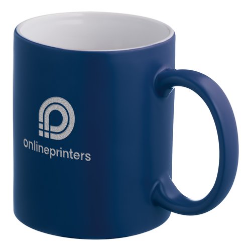 Blue ceramic mug with handle.