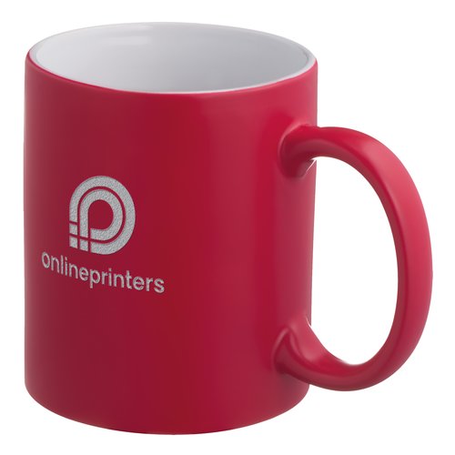 Red ceramic mug with handle.