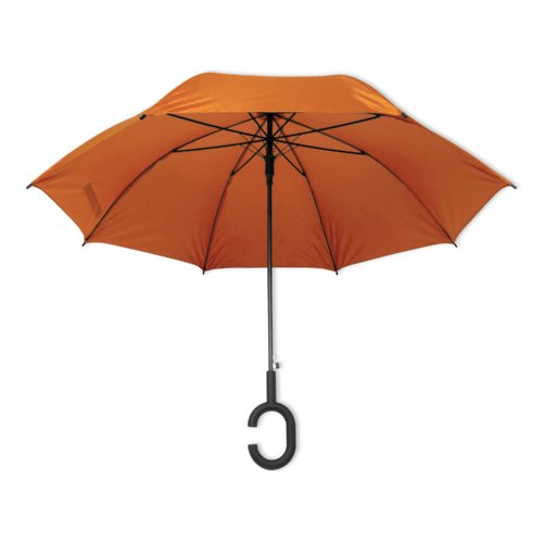 Orange umbrella with special handle.