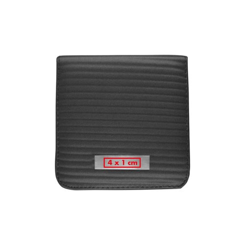 Black shoe shine kit with multiple parts.