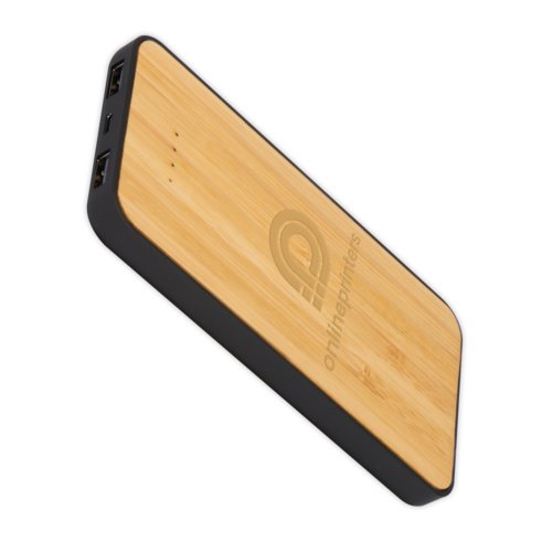Beige bamboo power bank/wireless charger with USB ports.