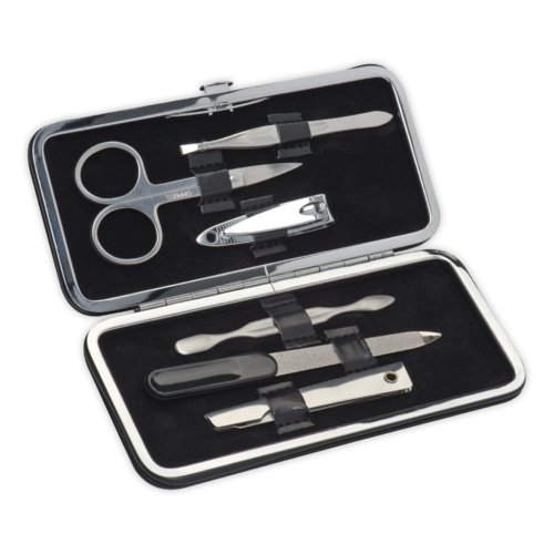 Multi-piece metal manicure set with case.