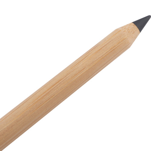 Beige bamboo writing instrument for writing and drawing.