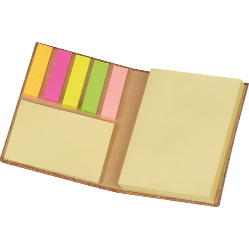 Beige cork notebook with sticky notes and markers.