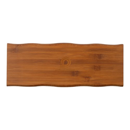 Bamboo cutting board with wavy edge.