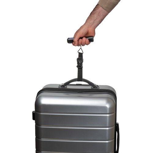 Black luggage scale with digital display and carrying strap.