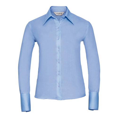 Sky blue women's blouse made of cotton with long sleeves and button placket.