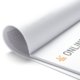 Paper desk pad with a wipeable surface.