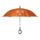 Orange umbrella with special handle.
