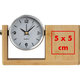 Wood-colored pen holder with analogue clock.