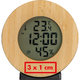 Wooden weather station with digital display and sensors.