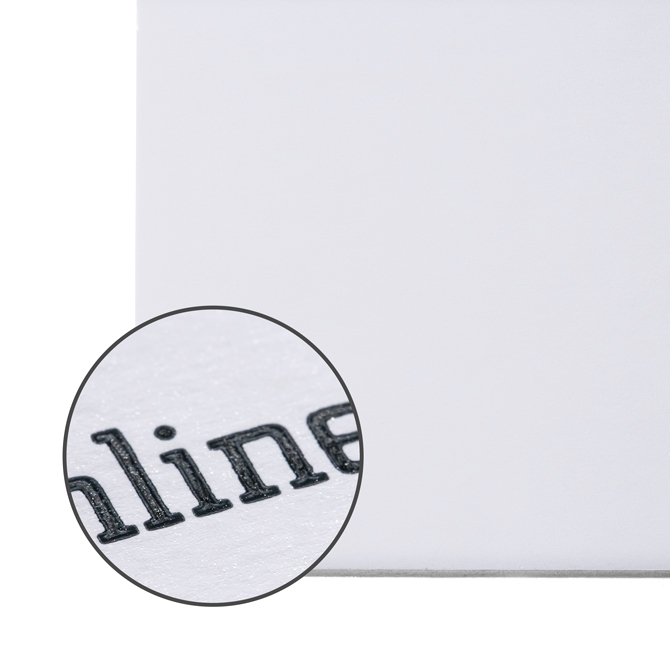 Image Close-up of art paper with a smooth, white surface and a fine texture.